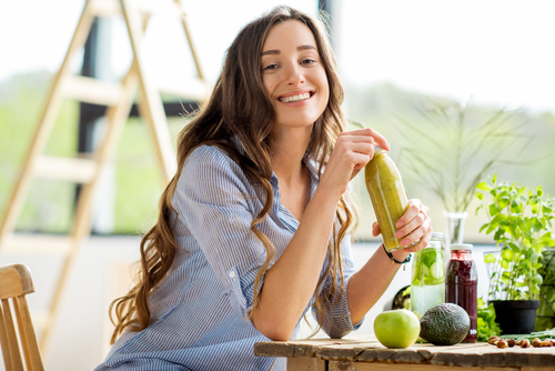 woman with fresh squeezed juice